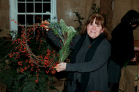 181206_4216_NX1 A Participant Displays Her Winterscapes Floral Design at Westmoreland Sanctuary