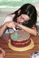 910923_0002_F1 Kym Decorates Dad's Birthday Cake