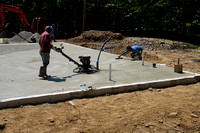 230802_09109_A7RIV Workers Put a Finish on the Freshly Poured Slab of the new Environmental Education Center at Westmoreland Sanctuary