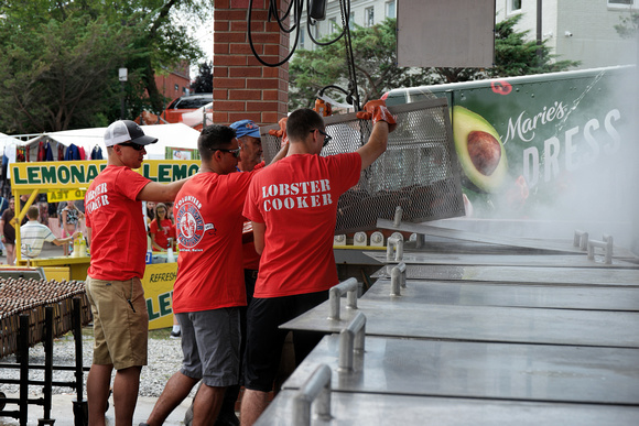 170804_3364_NX1 This Morning's Catch of Live Lobsters is Hoisted to a Boiling Vat at the 2017 Maine Lobster Festival