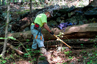 220916_07586_A7RIV Volunteer Fred of the NY-NJ Trail Conference Digs for Stones to Use on the 1 Mile New Westmoreland Trail
